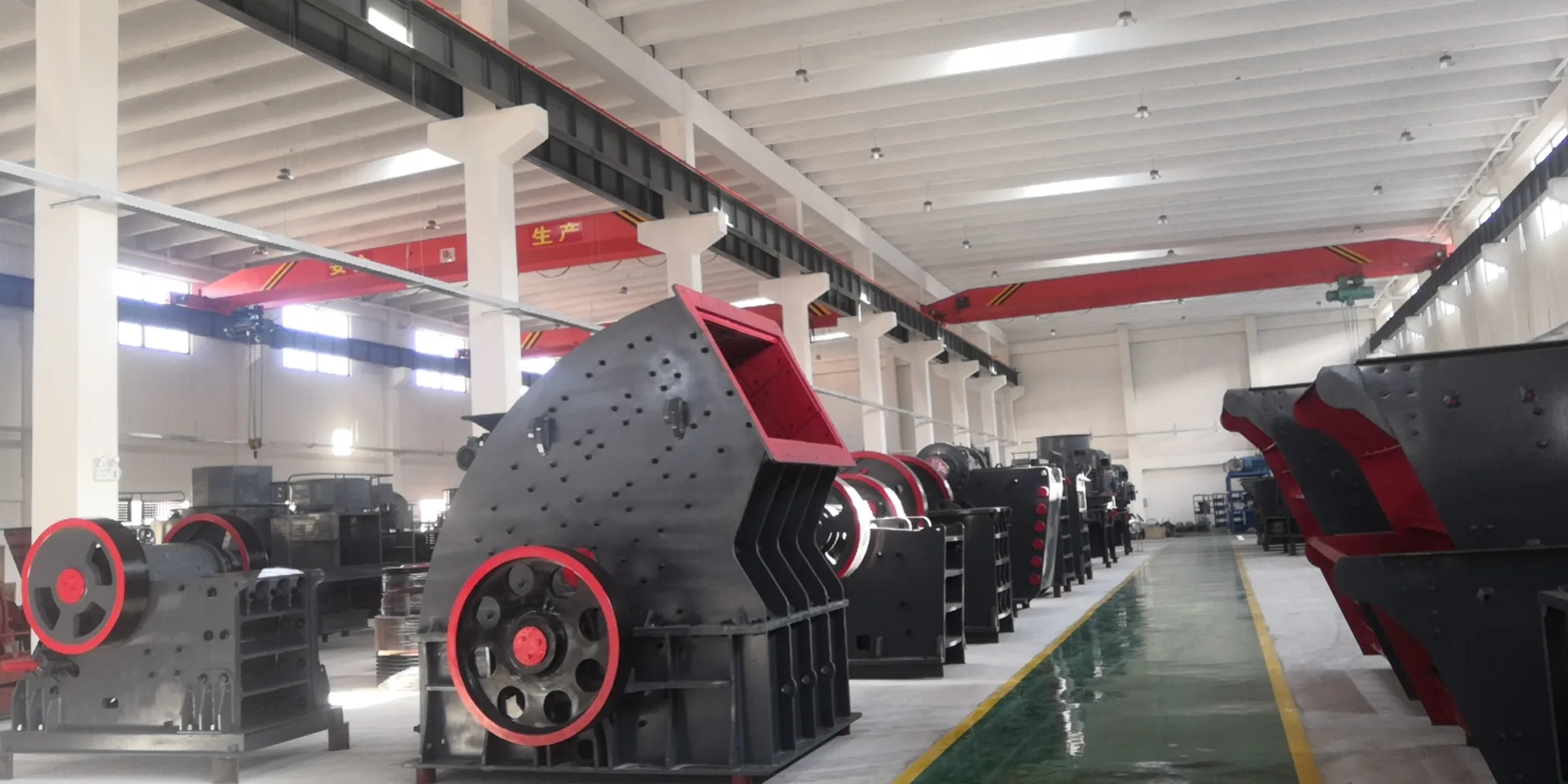 Heavy hammer crushers arranged inside the Cronus manufacturing workshop