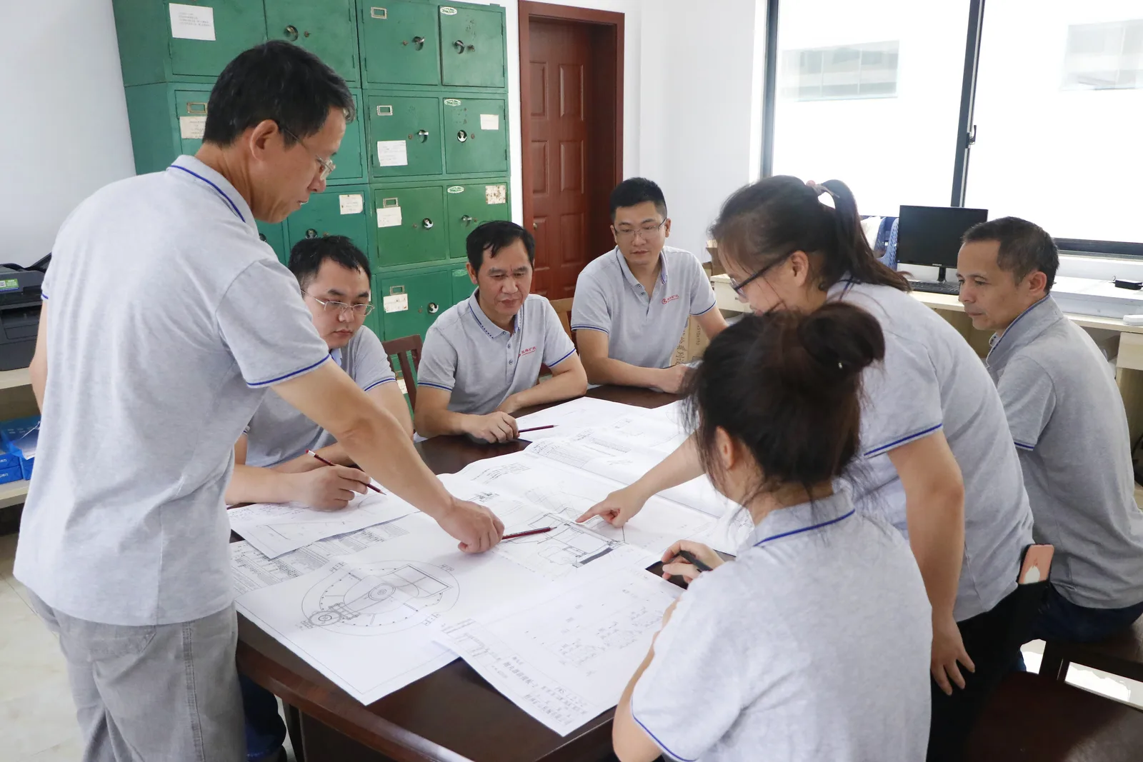 Cronus engineering team reviewing an equipment project
